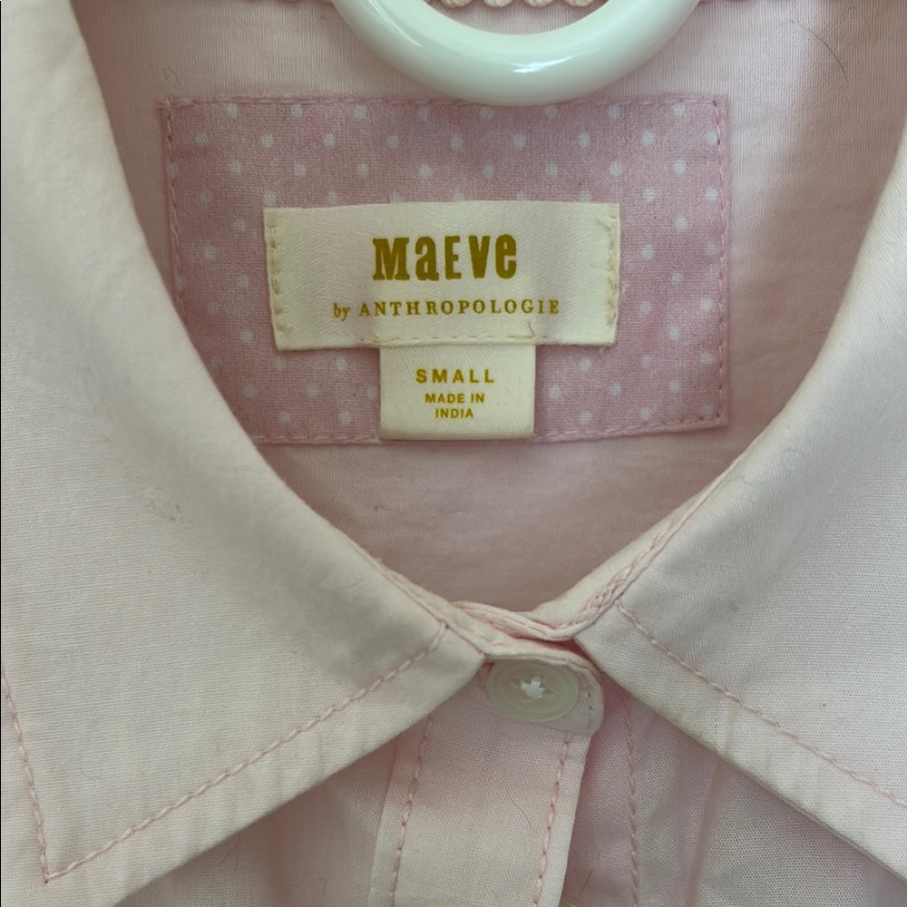 Maeve Pink Button-Up Shirt by Anthropologie.